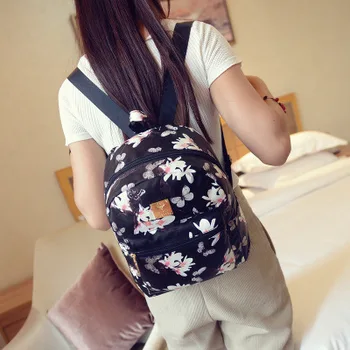 2022 Пролетната дамска чанта от изкуствена кожа Чанта за момичета Корейската версия Раница с флорални принтом Цвете чанта на рамото Женски мини-раница